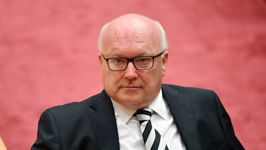 MPs who can "honestly swear" they didn't know they were dual citizens should be ruled eligible, George Brandis told the High Court.