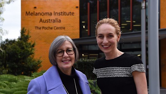 Professor Georgina Long, right, with clinical trial participant Renae Aslanis outside the Melanoma Institute Australia's offices in Sydney.