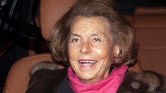 Liliane Bettencourt is seen as she leaves Armani' spring/summer fashion collection, in Paris, 2011. 