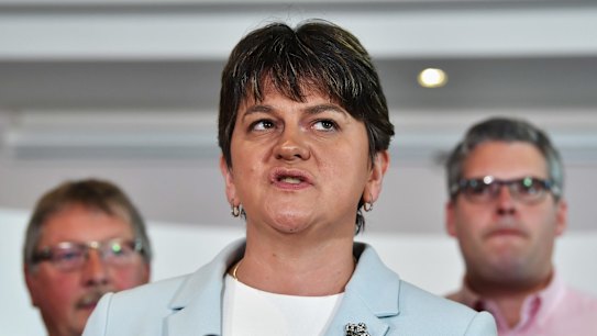 DUP leader Arlene Foster stands with fellow DUP MPs as she addresses the news of a possible Parliamentary agreement with the Conservative party.