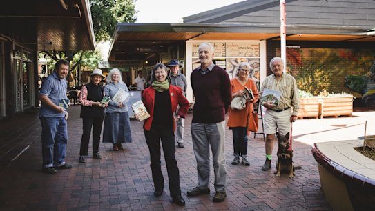 It's been one year since the ACAT tribunal retired to consider their appeal against the redevelopment of a Dickson car park into a Coles supermarket and apartment complex. Front, Jane Goffman and Ron Brent. Behind, Denis O'Brien, Jacqui Pinkava, Rosemary Urquhart, Paul Costagan, Robin d'Arcy, and John Carroll. 
