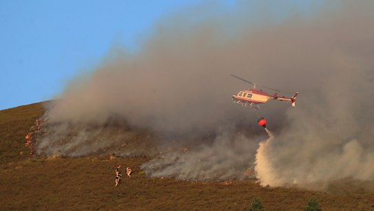 Hills ablaze near Manchester as bushfire rages for fourth day