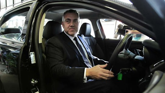 Joe Hockey meeting with John Altomonte Alto Ford, Craig Sutton Suttons, Greg Hatton MTA nsw, Nick Karagiannis Honda, Craig Laundy Candidate of Reid and Joe Hockey at Suttons holden car yard Parramatta Rd, Homebush