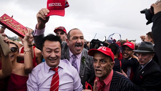 Punters celebrate Redzel winning the TAB Everest horse race held at Royal Randwick Racecourse on October 13, 2018. Photo: Dominic Lorrimer