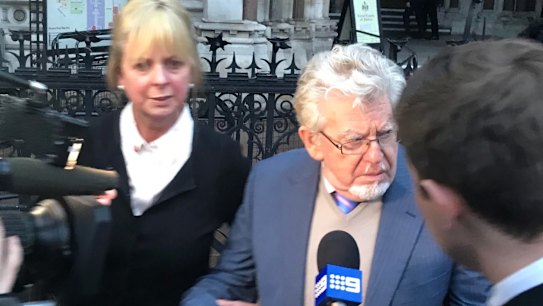 Australian entertainer Rolf Harris leaves a London court during his appeal on Tuesday.