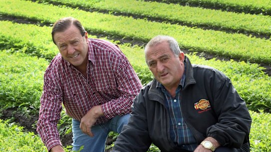 Lobster dinner host Frank Lamattina (right) with Liberal councillor Geoff Ablett at Mr Lamattina's farm.