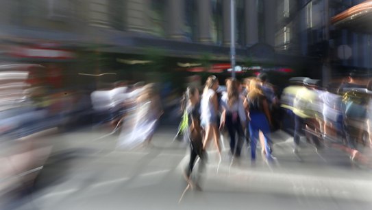 SYDNEY, AUSTRALIA - December 28, 2017: SYDNEY, AUSTRALIA - SMH NEWS: 281217: GENERICS- Christmas shoppers and city crowds cross the road in the Sydney, CBD. Shopping. Retail. ATM. Banking. Banks. Credit. Visa. Loans. Plastic. Bankcard. EFTPOS. EFT. (Photo James Alcock /Fairfax Media).