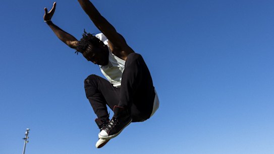 Dancer and Choreographer Lucky Lartey dances on a cricket pitch at Beaman Park in Earlwood during the Covid-19 lockdown in Sydney.