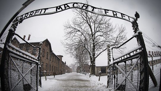 The entrance to the former Nazi concentration camp Auschwitz-Birkenau with the lettering 'Arbeit macht frei' ('Work makes you free') in Oswiecim, Poland. 