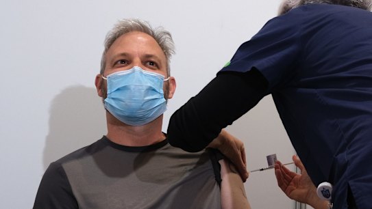 Victorian Chief Health Officer Brett Sutton receives his first COVID-19 vaccination at the Royal Exhibition Building in Carlton on April 21, 2021 in Melbourne, 