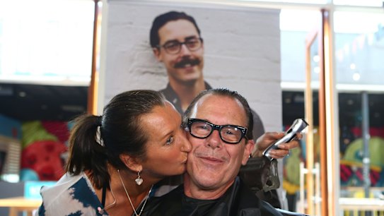 Former INXS guitarist Kirk Pengilly with his wife surfing champion Layne Beachley.