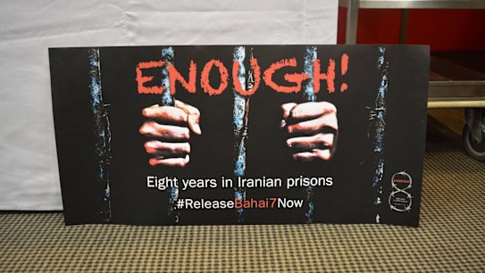 A poster calling for the release of seven Baha'i leaders in Iran at the launch of an open letter by 26 prominent Australian lawyers at NSW Parliament. 