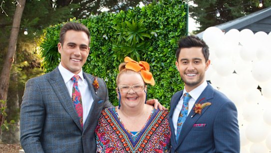 Rainbow over Ramsay Street: Magda Szubanski (Jemima Davies-Smythe) helps Matt Wilson (left, Aaron Brennan) and Tayaka Honda (David Tanaka) tie the knot.  