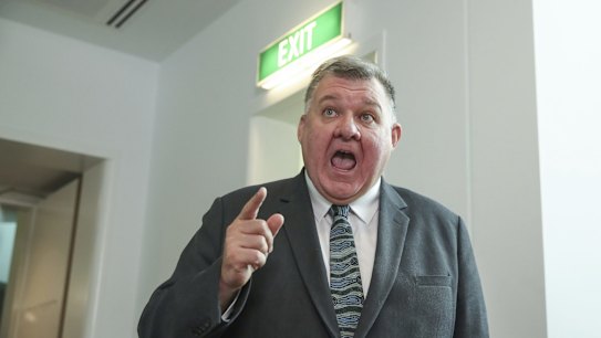 Crossbench MP Craig Kelly during a doorstop interview in the press gallery at Parliament House in Canberra on  Wednesday 24 February 2021. fedpol Photo: Alex Ellinghausen
