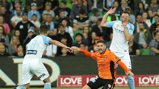 Contentious decision: Brandon Borello of the Roar goes down in the penalty box.