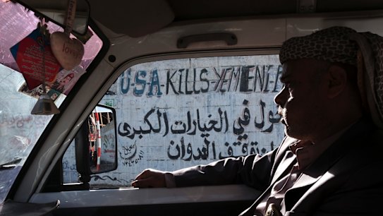 Anti-American graffiti on the street in Yemen's capital Sanaa.