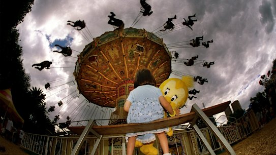 Sophie Wong watches the ride on the last day of Moomba, 1999.