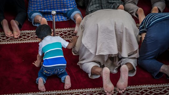 Gungahlin mosque, early afternoon prayer session the day after the mass shootings at mosques in Christchurch New Zealand.Â  Photo by Karleen Minney.