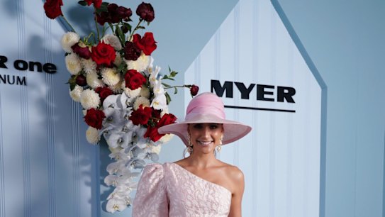 Myer ambassador Rachael Finch wears Nicola Finetti dress and Melissa Jackson hat at the Myer marquee on Oaks Day 2018.