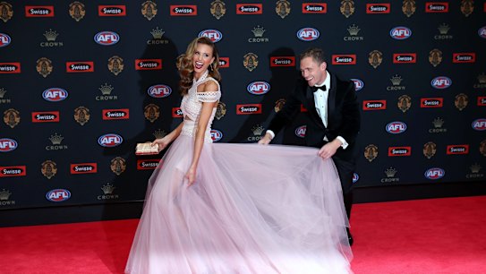 Joel Selwood of the Geelong Cats and Brit Davis pose on the red carpet ahead of the 2016 AFL Brownlow Medal count at Crown Palladium on September 26, 2016 in Melbourne, Australia. (Photo by Pat Scala/Fairfax Media) *** Local Caption *** Joel Selwood; Brit Davis