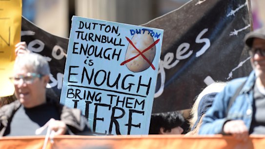 Protesters rally in Melbourne against the treatment of refugees on Manus Island.
