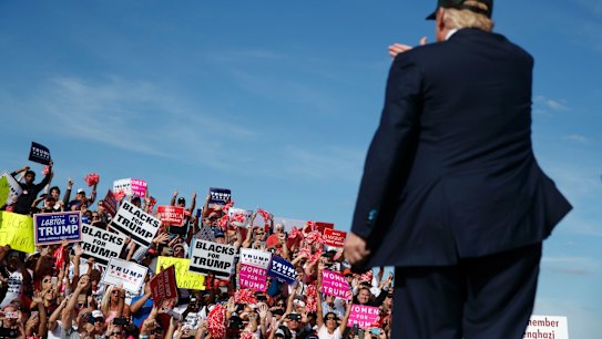 One man against the world: Donald Trump at a campaign rally in Florida.