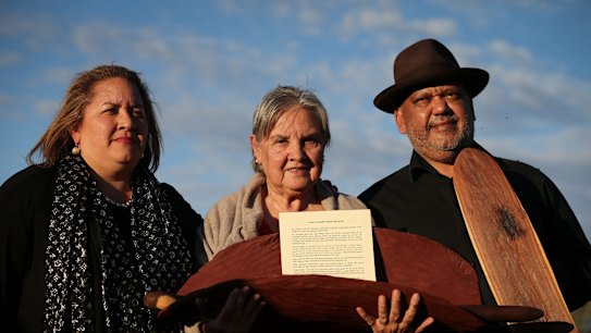 Megan Davis, Pat Anderson from the Referendum Council holding the Uluru statement, and Noel Pearson.