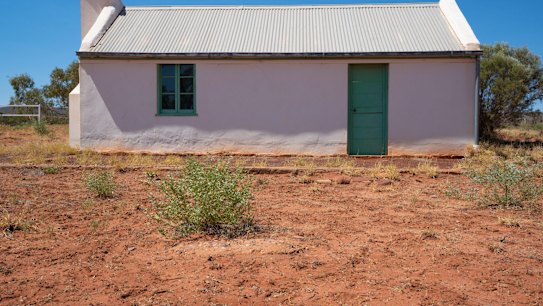 Albert Namatjjra's house is humble, dilapidated, fenced off and neglected.