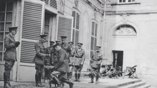 King George V, knighting Lieutenant General Sir John Monash, at the Corps Headquarters in the Chateau de Bertangles.