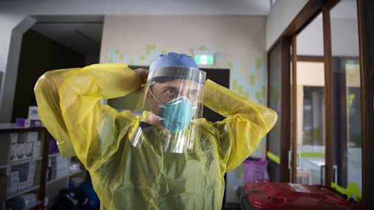 Nurse Jarrod Tunks working at the St Vincents Hospital new Covid-19 testing clinic at East Sydney Community and Arts Centre. Coronavirus Pandemic. 17th April 2020 Photo Louise Kennerley EMBARGOED FOR SMH FIRST USE