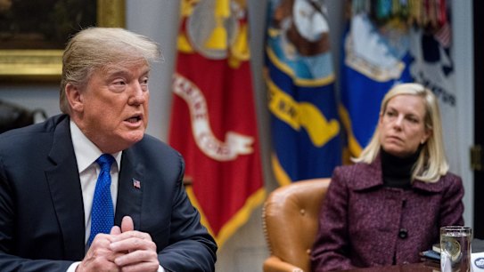 President Donald Trump's (seen here with Secretary of Homeland Security Kirstjen Nielsen) decision to end the protected status for Salvadorans is part of his broader push to tighten immigration laws and expel those living in the US illegally. 