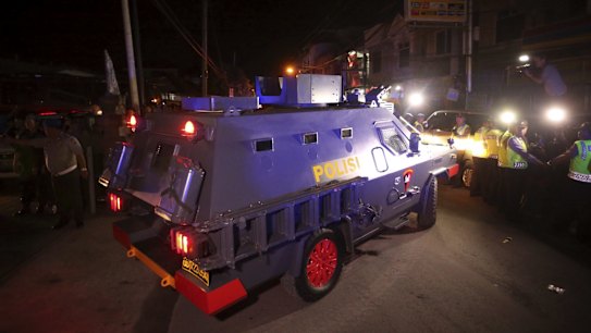 A Wolf armoured vehicle carrying Bali nine duo Andrew Chan and Myuran Sukumaran leaves Kerobokan prison to begin the transfer to Nusakambangan prison island where they are to be executed.