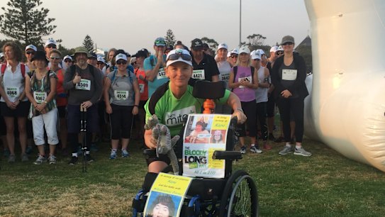 Karen Crawley setting out on the third of her seven Bloody Long Walks (Sydney East on 24 September) with Kara?s wheelchair. for Julie Power mitochondrial disease story photo: supplied