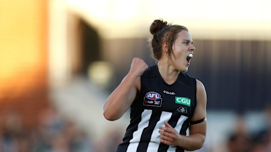 Collingwood's Jasmine Garner celebrates kicking a goal, the first of the match and her team's only major score for the night.