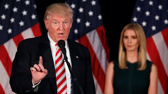 Ivanka Trump, right, watches as her father Republican presidential candidate Donald Trump delivers a policy speech on child care, Tuesday, Sept. 13, 2016, in Aston, Penn. (AP Photo/Evan Vucci)
