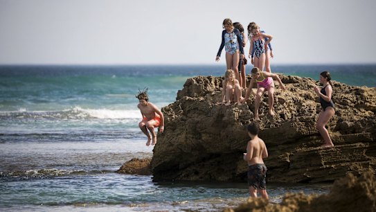 Kids having fun in the sun at Sorrento Ocean Beach