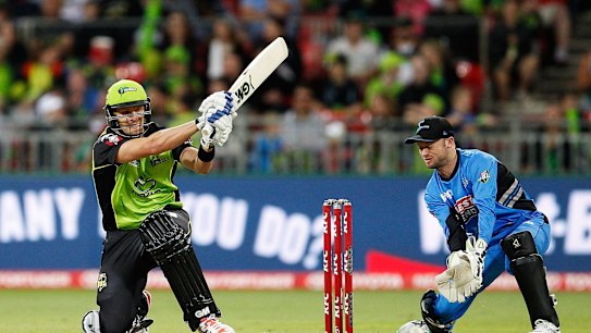 No frills: Shane Watson shows some clean willow for Thunder.