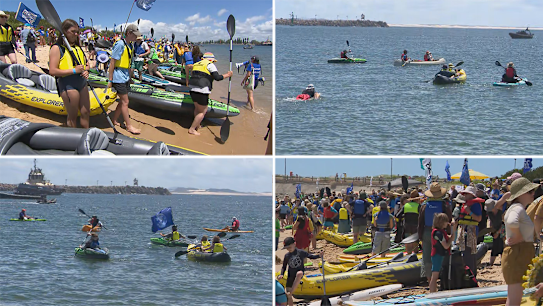 A group of climate activists have blocked the Port of of Newcastle using surfboards, kayaks and boats.