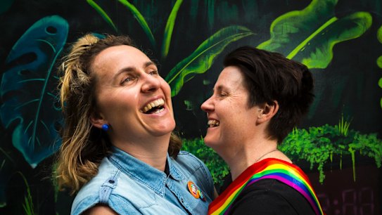 Zoe McDonald and Katie Larsen celebrate the "yes" vote at the State Library in Melbourne. 