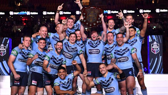 NSW players celebrate winning the 2018 State of Origin series.