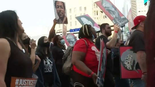 Police confirm one person wounded at event marking one year since George Floyd’s death.