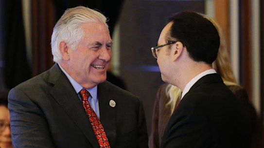 US State Secretary Rex Tillerson, left, is greeted by Philippine Foreign Affairs Secretary Allan Peter Cayetano in Manila.