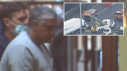 The truck driver who killed four police officers when he crashed a 19-tonne semi-trailer into them on Melbourne's Eastern Freeway has had his jail sentence reduced on appeal.