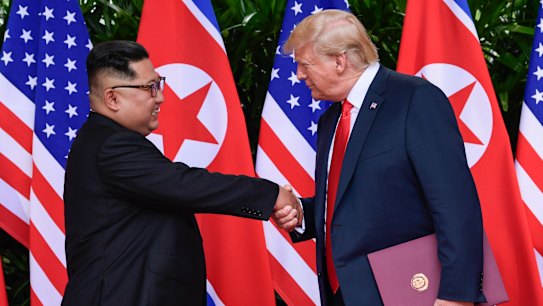 Trump and Kim's 13-second handshake in a scene as complex as their rivalry