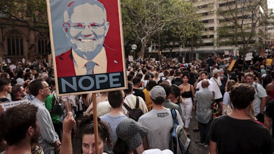 Thousands gather at Town Hall in Sydney CBD to demand action on climate change and the deposition of Prime Minister Scott Morrison.