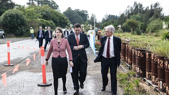 Premier Gladys Berejiklian (left), WestConnex Minister Stuart Ayres and Sydney Motorway Corporation chief executive Dennis Cliche early this month.