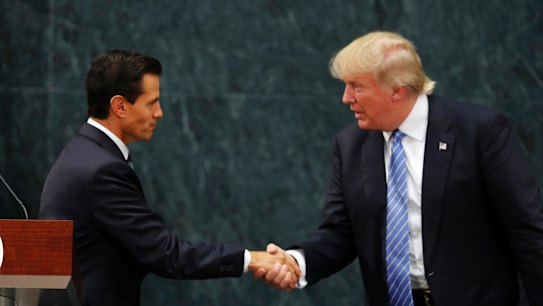 Looking presidential: Mexico President Enrique Pena Nieto and Donald Trump shake hands. 