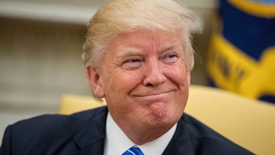 Donald Trump smiles while meeting with Abu Dhabi's Crown Prince Sheikh Mohammed bin Zayed Al Nahyan on Monday.
