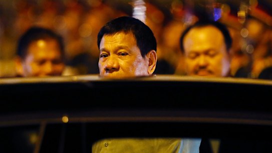 Philippine President Rodrigo Duterte boards his limousine upon arrival in Vientiane, Laos.