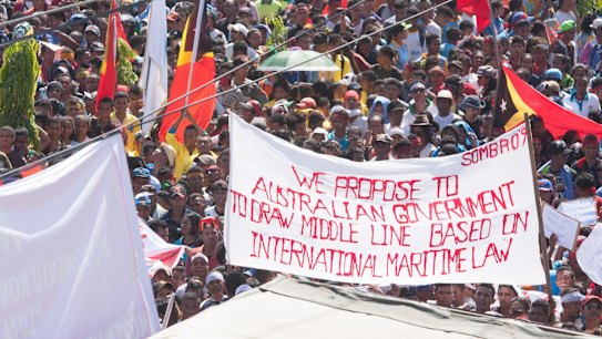 At least 10,000 people protest in Dili last year against Australia's stance on the oil and gas meridian line in the Timor Sea. 